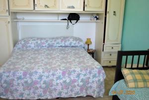 Ένα ή περισσότερα κρεβάτια σε δωμάτιο στο Charming house in Locorotondo, enclosed garden