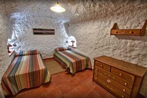 Cama o camas de una habitación en 2 bedrooms property with shared pool at Gorafe