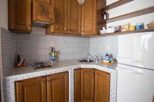 Η κουζίνα ή μικρή κουζίνα στο House with garden and sea view in Lipari +14 φωτογραφίες