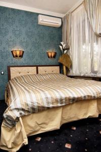 Ένα ή περισσότερα κρεβάτια σε δωμάτιο στο Annabelle отель