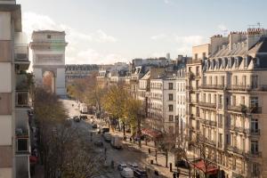 a view of a city street with buildings at Elysées Ceramic in Paris