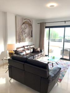 A seating area at Spacious Apartment with Views in Málaga, 77 m², Shared Pool