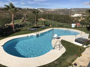 The swimming pool at or close to Spacious Apartment with Views in Málaga, 77 m², Shared Pool