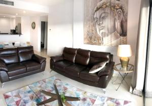 A seating area at Spacious Apartment with Views in Málaga, 77 m², Shared Pool