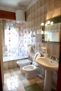 a bathroom with a toilet and a sink at 2 bedrooms appartement with terrace at Vita in Vita