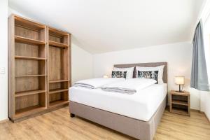 Postel nebo postele na pokoji v ubytování Apartment Rainer - mittendrin