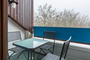 Ferienwohnung Schlegel的阳台或露台