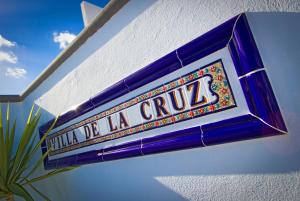 Ein Zertifikat, Auszeichnung, Logo oder anderes Dokument, das in der Unterkunft Villa De La Cruz ausgestellt ist