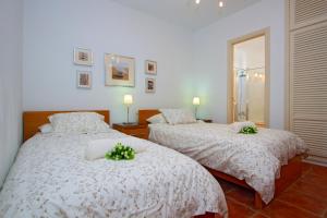 Ein Bett oder Betten in einem Zimmer der Unterkunft Villa De La Cruz
