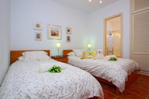 Ein Bett oder Betten in einem Zimmer der Unterkunft Villa De La Cruz