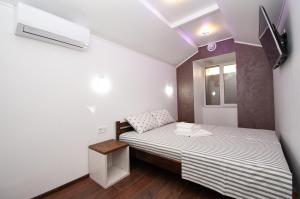 Posteľ alebo postele v izbe v ubytovaní Apartments on Chaykovskogo 16