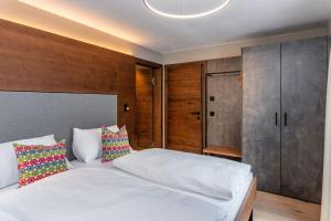 Łóżko lub łóżka w pokoju w obiekcie Appartements Wehrhof by Schladmingurlaub