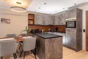 Kuchnia lub aneks kuchenny w obiekcie Appartements Wehrhof by Schladmingurlaub
