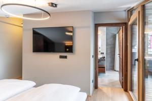 Łóżko lub łóżka w pokoju w obiekcie Appartements Wehrhof by Schladmingurlaub
