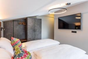 Łóżko lub łóżka w pokoju w obiekcie Appartements Wehrhof by Schladmingurlaub
