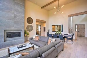 a living room with a couch and a fireplace at Mountain-Base Lodge 6 Miles to Downtown Bend in Bend