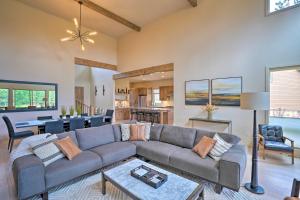 a living room with a couch and a table at Mountain-Base Lodge 6 Miles to Downtown Bend in Bend