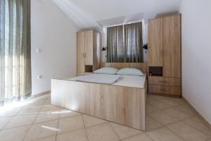 Ένα ή περισσότερα κρεβάτια σε δωμάτιο στο Apartment Goran