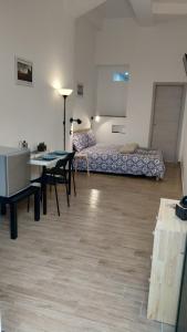 Posteľ alebo postele v izbe v ubytovaní Policlinico Messina Bed&Bed