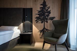 Postel nebo postele na pokoji v ubytování Hotel Cappella