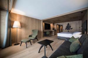 Postel nebo postele na pokoji v ubytování Hotel Cappella