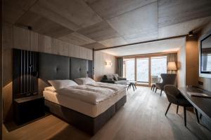 Postel nebo postele na pokoji v ubytování Hotel Cappella