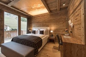 Postel nebo postele na pokoji v ubytování Hotel Cappella