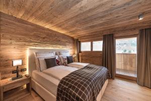 Postel nebo postele na pokoji v ubytování Hotel Cappella + 37 fotografií