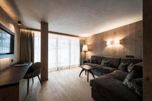 TV a/nebo společenská místnost v ubytování Hotel Cappella
