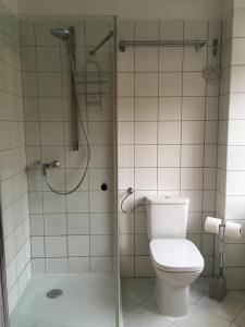 Koupelna v ubytování Gábriel Apartman + 12 fotografií