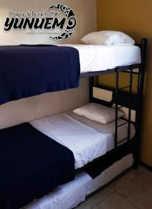 Postel nebo postele na pokoji v ubytování Casa & Beach Club Yunuem