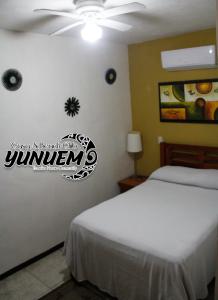 Postel nebo postele na pokoji v ubytování Casa & Beach Club Yunuem