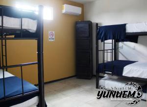 Postel nebo postele na pokoji v ubytování Casa & Beach Club Yunuem
