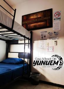 Postel nebo postele na pokoji v ubytování Casa & Beach Club Yunuem