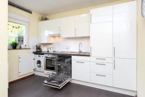 Kuchyň nebo kuchyňský kout v ubytování Ferienhaus Nike