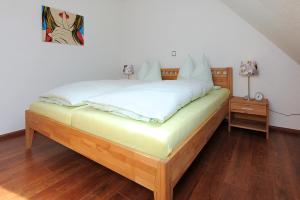 Postel nebo postele na pokoji v ubytování Ferienhaus Nike