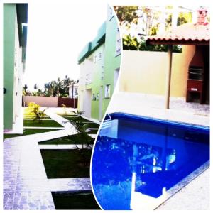 una piscina azul frente a un edificio en Condominio Brasil Coroa, en Porto Seguro