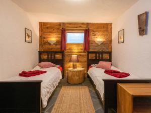 Letto o letti in una camera di Chalet L'échappée belle