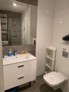 Kúpeľňa v ubytovaní Apartament Admiralski