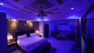 Voodi või voodid majutusasutuse Lantana Hotel toas