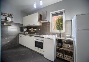 Kuchyň nebo kuchyňský kout v ubytování Apartment Korado