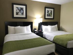 NavajoLand Hotel客房内的一张或多张床位