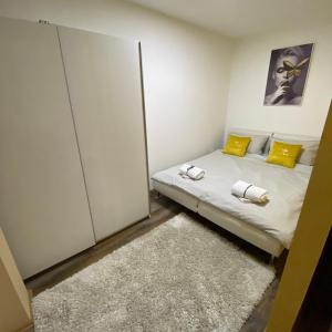 Postel nebo postele na pokoji v ubytování Ana Luxury Apartment ****