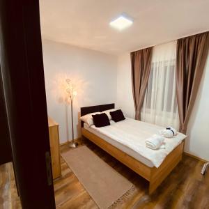 Postel nebo postele na pokoji v ubytování Ana Luxury Apartment ****