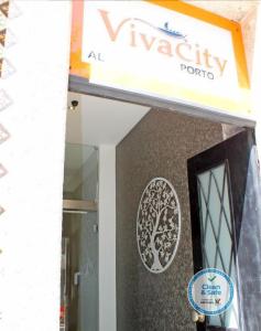 a sign on the front of a vaughn pottery store at Vivacity Porto - Rooms & Apartments in Porto