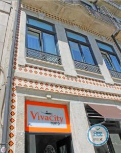 a building with a virginity centre sign in front of it at Vivacity Porto - Rooms & Apartments in Porto