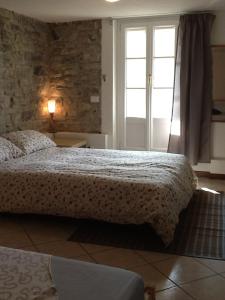 A bed or beds in a room at Casa Lidia