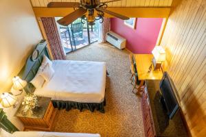 an overhead view of a bedroom with a bed and a television at Lake Lawn Resort in Delavan