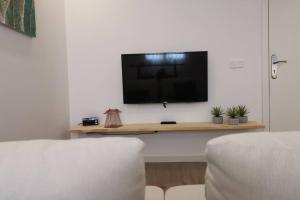 TV a/nebo společenská místnost v ubytování Moraira Dream - RENOVATED - Moraria City Center
