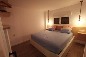 Postel nebo postele na pokoji v ubytování Moraira Dream - RENOVATED - Moraria City Center